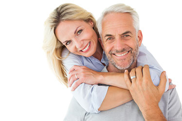 perimenopausal woman with partner and flower